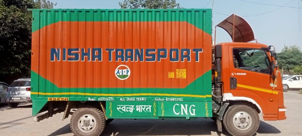 Nisha Transport orange truck